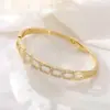 Wholesale Women’s Circle Bangle Featuring Zircon Inlay, Electroplated Copper Craft