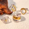 oly-4ee154358fd3b0cf1cde2e63d5448bfe Wholesale PVD Coated Real Gold Plated 18K Gold Argyle 304 Stainless Steel Casual Retro Waterproof Non Tarnish Open Rings