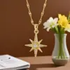 Wholesale Starburst Inlay Pendant Necklace For Women, 18K Gold Plated Copper With Artificial Rhinestones And Lip Chain