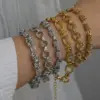 oly-4ff39fcdd15b794917bf96fdf27a2dcf Wholesale Luxurious Fashion 18K Gold Plated Stainless Steel Knotted Geometric Chain Bracelet Casual Elegant Women's Style Classic Design