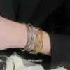 Wholesale Round Copper Bangle With Real Gold Plating And Rhinestone Inlay In Elegant Gold