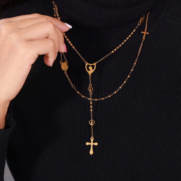 Wholesale British Style Retro Niche Personality Jewelry Embossed Figure Round Brand Tassel Cross Pendant Titanium Steel Gold Plated Necklace