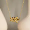 Wholesale 201 Stainless Steel 304 Stainless Steel Ferroalloy Sun Heart Shape Flower Electroplating Ion Plating (IP) Real Gold Plated Simple Style Waterproof Non Tarnish Cable Chain Gold Pendant Necklace