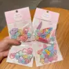 oly-5224d18f543e6c3cd677fa90468c886c Wholesale Mini Star Thumb Jelly Hair Clips Girls Mini Elastic Hair Bands Festive Resin Hair Accessories For Everyday Cute Female Children