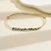 oly-525187eb1bcd74f1fc2fc7feaa674e46 Wholesale Handmade Golden Plated Wristband With Solid Color Natural Stone And 0.03µm Coating Thickness, Featuring Handmade Chain For Women