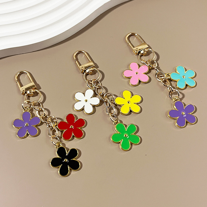 Wholesale Cross-border new ins double-sided drip oil color flower alloy keychain creative Airpods bag pendant