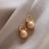Wholesale Simple Style Round Alloy Inlay Pearl Women's Earrings