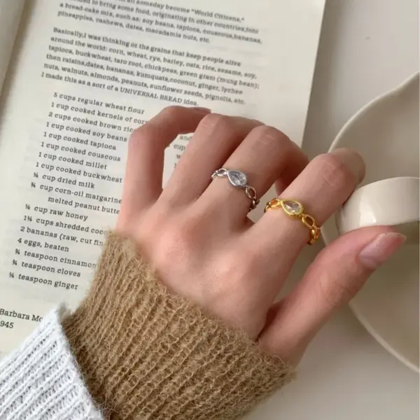 Wholesale Women’s Electroplated Water Droplets Ring In Golden Plated Brass With Zircon Inlay