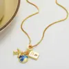Wholesale Vacation Streetwear Earth Airplane Copper 18k Gold Plated Zircon Pendant Necklace In Bulk