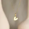 Wholesale 201 Stainless Steel 304 Stainless Steel Ferroalloy Sun Heart Shape Flower Electroplating Ion Plating (IP) Real Gold Plated Simple Style Waterproof Non Tarnish Cable Chain Gold Pendant Necklace