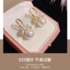 oly-558befdaeff943444d9f99774fdfc1b8 Wholesale Exquisite Shell Flower Basket Pearl Earrings Women's Fashion Diamond Small Flower Ear Buckle Korean Niche Gentle Ear Jewelry