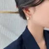 Wholesale Simple Style Round Alloy Inlay Pearl Women's Earrings