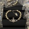 oly-568abc37bc1c00d60f098049c9733c70 Wholesale Empress Dowager Saturn Bracelet High Version Classic Saturn Diamond Pearl Bracelet Light Luxury All-match Pearl Bracelet