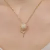 oly-56d70fca16d1949896f637a57c5faa14 Wholesale Basic Classic Style Sunflower Titanium Steel Inlay Zircon Pendant Necklace