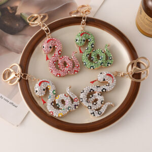 oly-575b7a00d1c80880183e4b607baf6937 Wholesale Creative cartoon diamond twelve zodiac snake metal car keychain national tide this year pendant small gifts