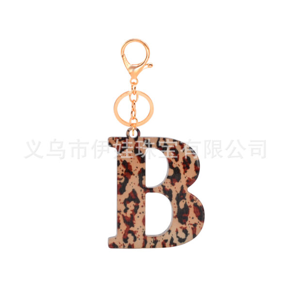 oly-576af3c3436fc05a6ea0d4a66f3e70e3 Wholesale Acrylic leopard print letter keychain 26 letters complete creative fashion jewelry transparent pendant gift