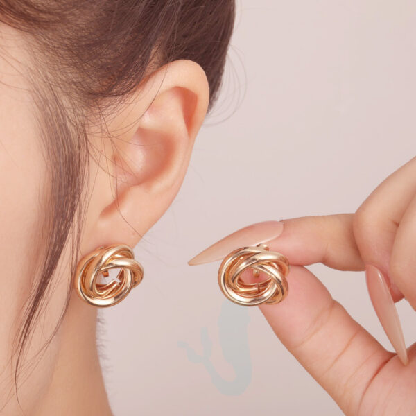 oly-57e2a849e3f11c2e73bec08700d4194d Wholesale special jewelry earrings creative metal elements circle multi-layer knotted earrings