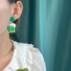 oly-585ca54b3a42325f83150622f6ba9648 Wholesale Patrick's Day earrings Irish Carnival personalized all-match Green acrylic glitter lucky grass earrings