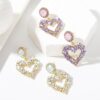 oly-586aba7a1a0f384cf86976027c0ef46c Wholesale Jewelry Gift Peach Heart Earrings Exaggerated Baroque Pearl Love Earrings Valentine's Day Earrings