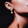 Wholesale 1 pair of summer temperament metal starfish pearl tassel ladies earrings earrings holiday style