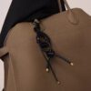 oly-5a4889ad1de252ba12bc3c75ecf2068a Wholesale selling high-end all-match jewelry pendant trend woven bag mobile phone case key chain pendant