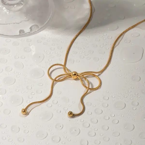 oly-5a56e60f49e21077783958eb6f20a813 Wholesale PVD Coated Real Gold Plated 18K Gold Bow Knot 304 Stainless Steel Simple Style Waterproof Non Tarnish 304 Stainless Steel Pendant Necklace