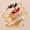 oly-5a9e00efdefa688dbc6ba14bb670a9dd Wholesale Stainless steel four-leaf clover jewelry, gold-plated swan titanium steel bracelet