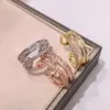 Wholesale Women’s C Shape Open Ring In Brass With 18K Real Gold Plated Water Plating And Zircon Inlay, Featuring Bezel Setting