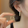 oly-5c8dfe0e606c390a079d23c10022df37 Wholesale Silver square ear buckle niche design light luxury high-grade earrings exquisite unique fashion diamond ring earrings
