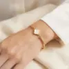 Wholesale Four Leaf Clover Bracelet For Unisex Featuring Simple Style Titanium Steel With 18K Real Gold Electroplated Plating
