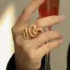 Wholesale Women’s Snake Open Ring With Claw Setting, Copper Base With KC Golden Water Plating, Featuring Zircon Inlay