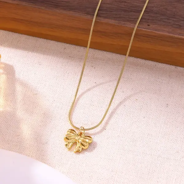 Wholesale Bow Knot Necklace For Women Featuring PVD Coated 18K Real Gold Plated 304 Stainless Steel With Waterproof Non Tarnish Finish On Cable Chain
