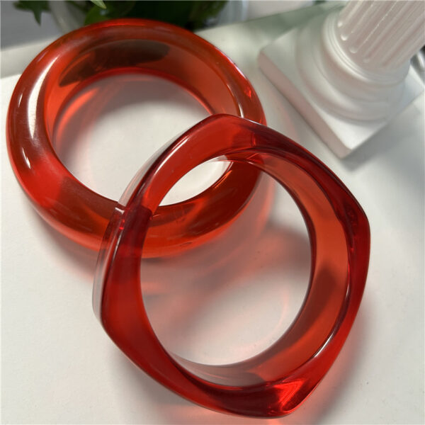 oly-5ea25426de2987e1e73034e75c1f1272 Wholesale Fashion Exaggerated Stylish Bracelet Transparent Red Resin Bracelet Style Stacked Bracelet