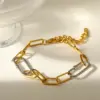 oly-5ebdabab6e567ba88bad363bd7184b2b Wholesale 18K Gold Plated 304 Stainless Steel Vacuum Electroplated Geometric Mixed Color Metal Contrast Cable Chain Cross Chain O Chain Jewelry Set For Women Independence Day