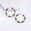 Wholesale color woven alloy handmade rice beads earrings  trend Carnival design sense earrings