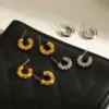 oly-5f7a91dcd1efc9e0a5f2c30168d601f6 Wholesale Three-dimensional Irregular Stud Earrings In 304 Stainless Steel With 18K Real Gold PVD Coating And 0.03µm Thickness