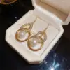 Wholesale Gold Water Droplets Ear Hook Earrings For Women In Zinc Alloy With Fish Hook Wires