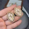 Wholesale French Style Oil Painting Drip Earrings Beige Sweet Niche Design Versatile Elegant Shell Embedded Copper Earrings For Women