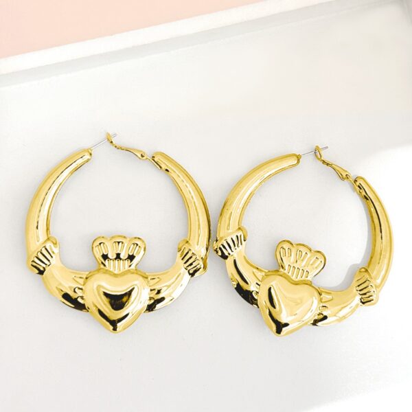 oly-5fc0517bc92fe4848c9c38bc3c82337b Wholesale Advanced Sense French Valentine's Day Simple Gold Earrings Love Crown Ring Ear Ring Holiday Music Festival Earrings