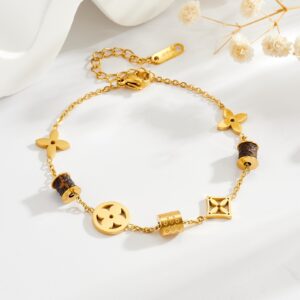 Wholesale Titanium steel 18k real gold electroplated bracelet, colorfast four-leaf clover necklace