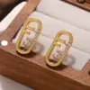 Wholesale Hypoallergenic Letter Stud Earrings For Women In Copper With KC Golden UV Plated Finish And Zircon Inlay