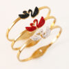 oly-62fb2e1e3ad532c390432db25e4d9317 Wholesale Stainless steel four-leaf clover jewelry, gold-plated swan titanium steel bracelet