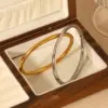 Wholesale 304 Stainless Steel Geometric Customization Laser Engraving PVD Coated 18K Real Gold Plated Casual Simple Style IG Style Waterproof Non Tarnish Gold Bangle