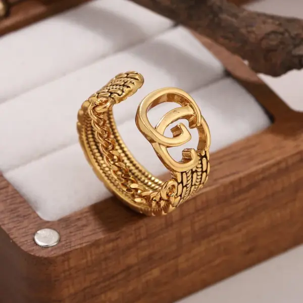 Wholesale Three-dimensional Letter Open Ring For Women In Copper With Golden Plated UV Plating And 0.03µm Thickness