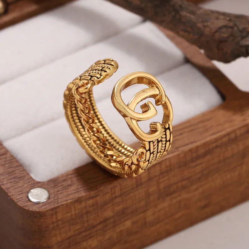 Wholesale Three-dimensional Letter Open Ring For Women In Copper With Golden Plated UV Plating And 0.03µm Thickness