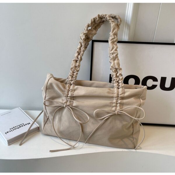 oly-64c5f81579d46d671c24eae3453a82a3 Wholesale Fashion Pleated Niche Design Large Capacity Tote Bag Korean Style Bow Women's Bag Single Shoulder Armpit Bag