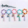 oly-66bdec725004220b4160984ef97b978a Wholesale Creative DIY Beaded Cartoon Butterfly Wrist Keychain Pendant Rainbow Leather PU Tassel Ring Key Ring Accessories
