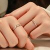 oly-685d73de484274479b94b42de3af51e7 Wholesale Sterling Silver Eternal Heart Knot Couple Ring Valentine's Day Ring for Men and Women Simple Exquisite Unique Color-separation Adjustable