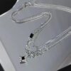 oly-69f96ef7b0532bf825c3ac913adef78e Wholesale Manxing double-layer necklace hip hop design sense niche personalized accessories advanced Qixi boys and girls clavicle chain