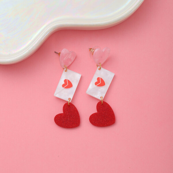 Wholesale Valentine's Day love acrylic sequin earrings peach heart sweet personality high sense earrings women